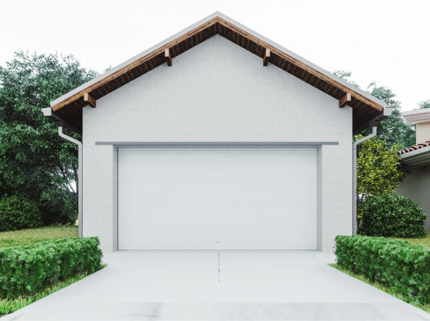 New modern garage door installation in Greer, SC, showcasing a high-quality insulated white flush-panel door for an upscale home exterior.