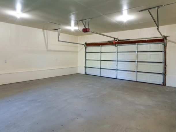 Expert garage door motor and track installation in Greer, SC, for residential double-car overhead doors.